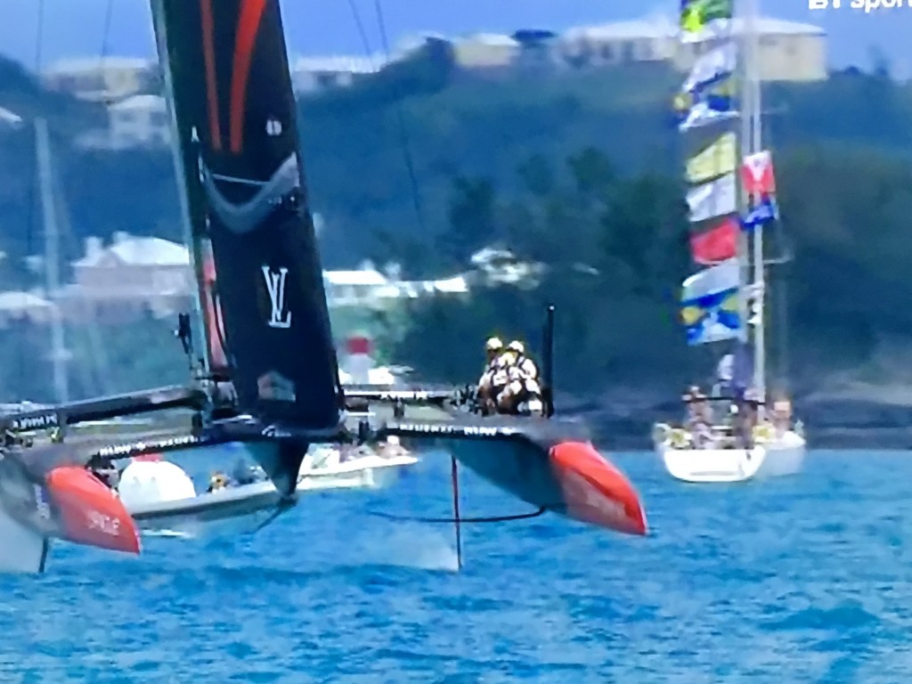 Heartbeat IV flying her flags close to the action at the 35th America's Cup